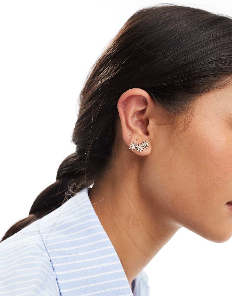 ASOS DESIGN stud earrings with multi star stud detail in gold tone