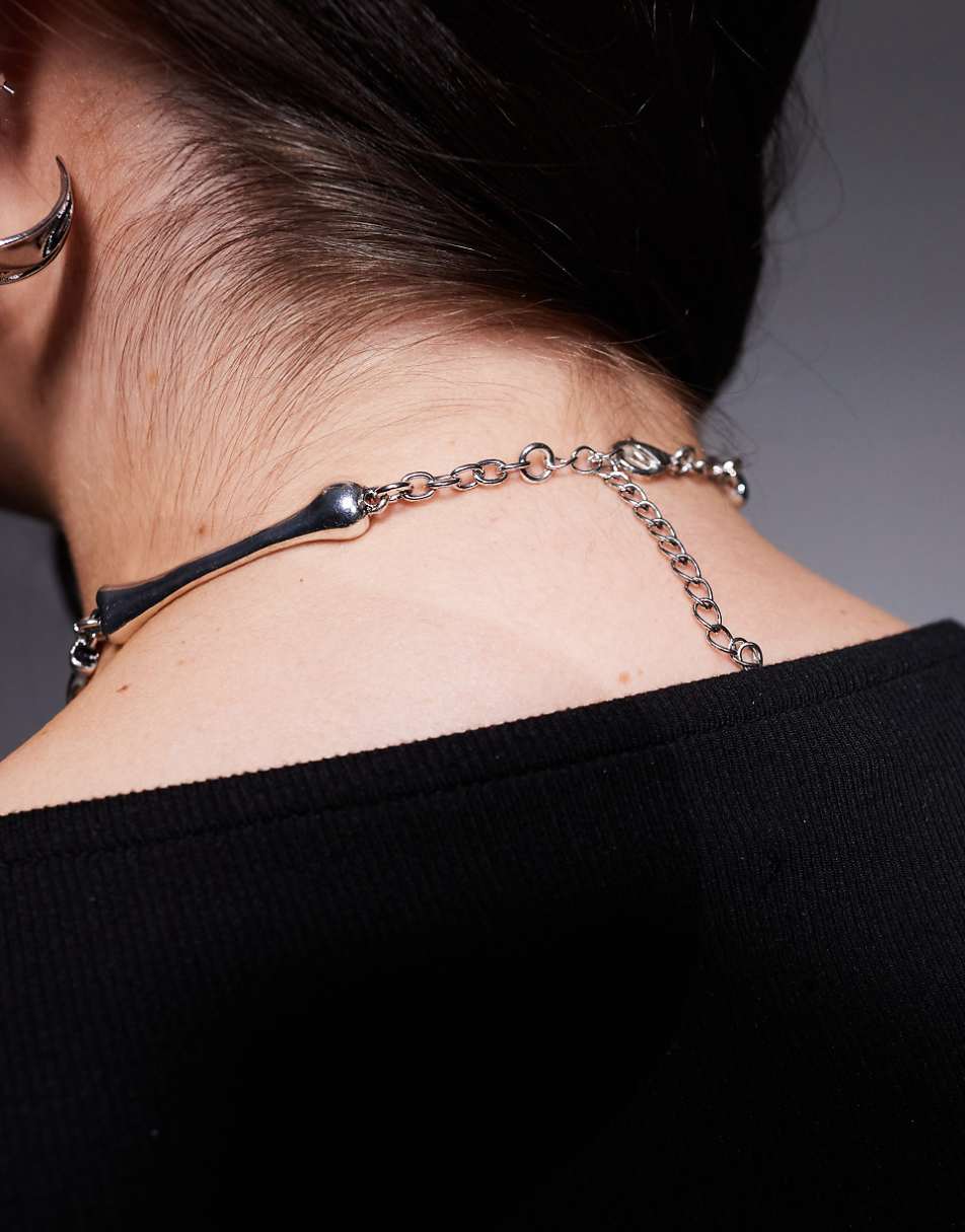 ASOS DESIGN Curve Halloween choker necklace with skeleton hand design