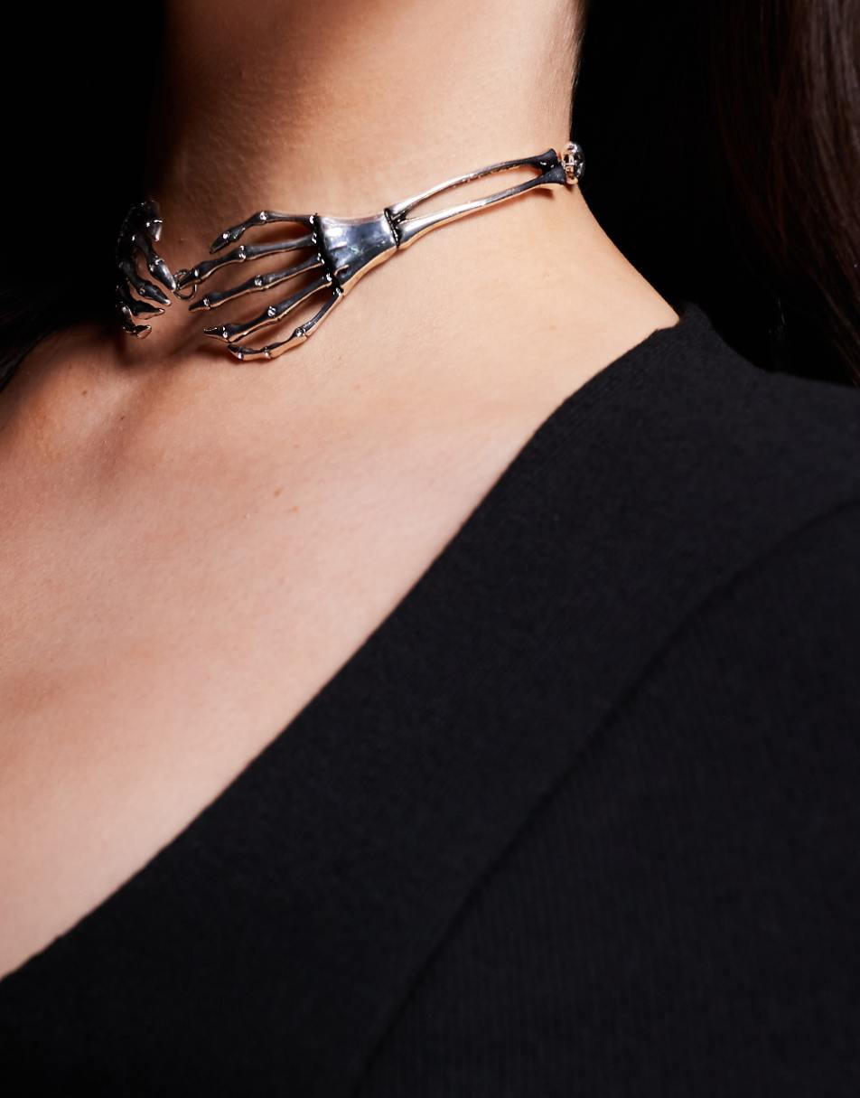 ASOS DESIGN Curve Halloween choker necklace with skeleton hand design