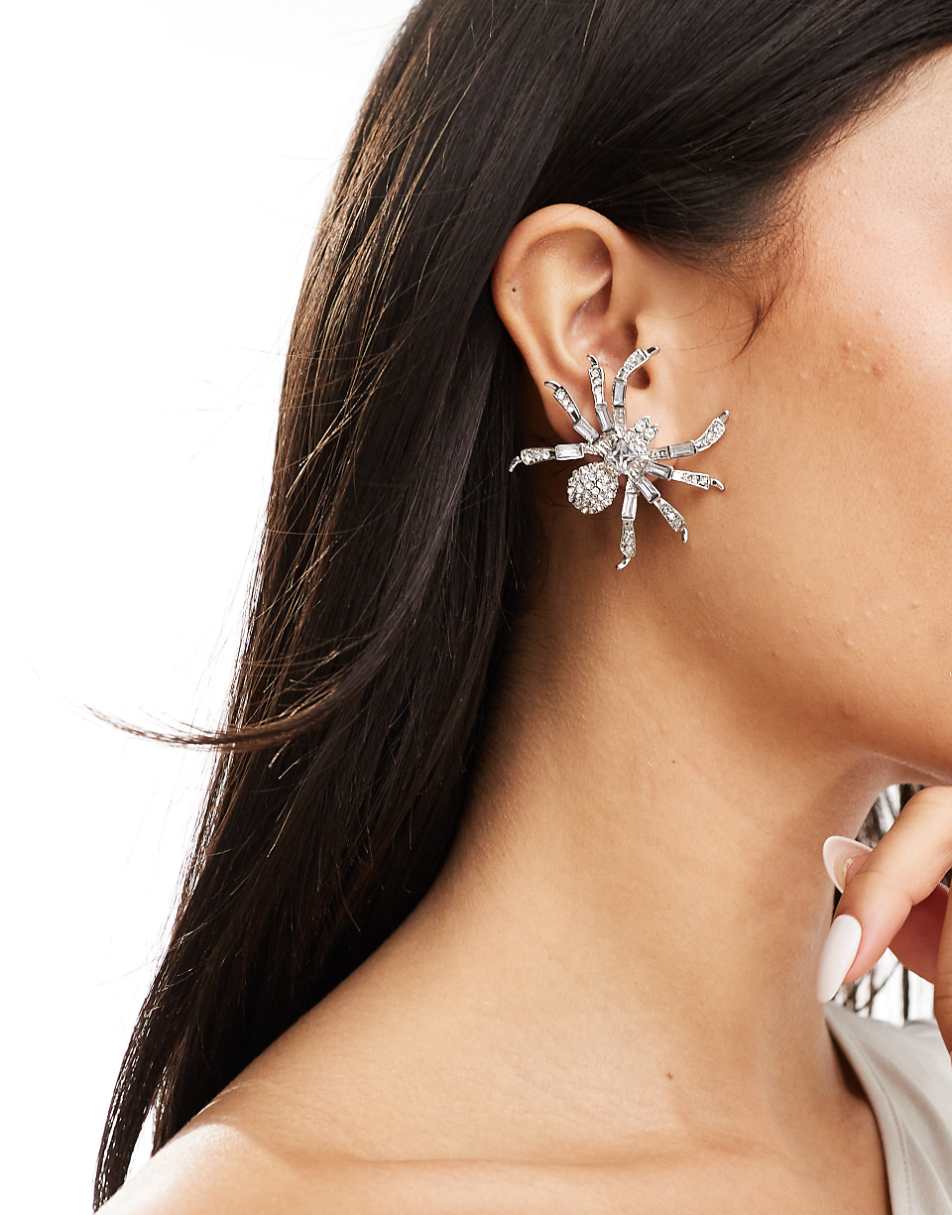 ASOS DESIGN Halloween stud earrings with crystal spider design in gunmetal