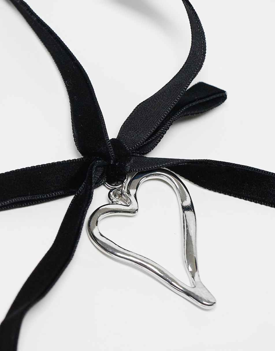 Reclaimed Vintage heart pendant on black velvet bow