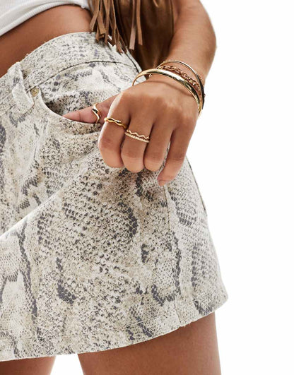 Bershka faux leather mini skirt in snakeskin print