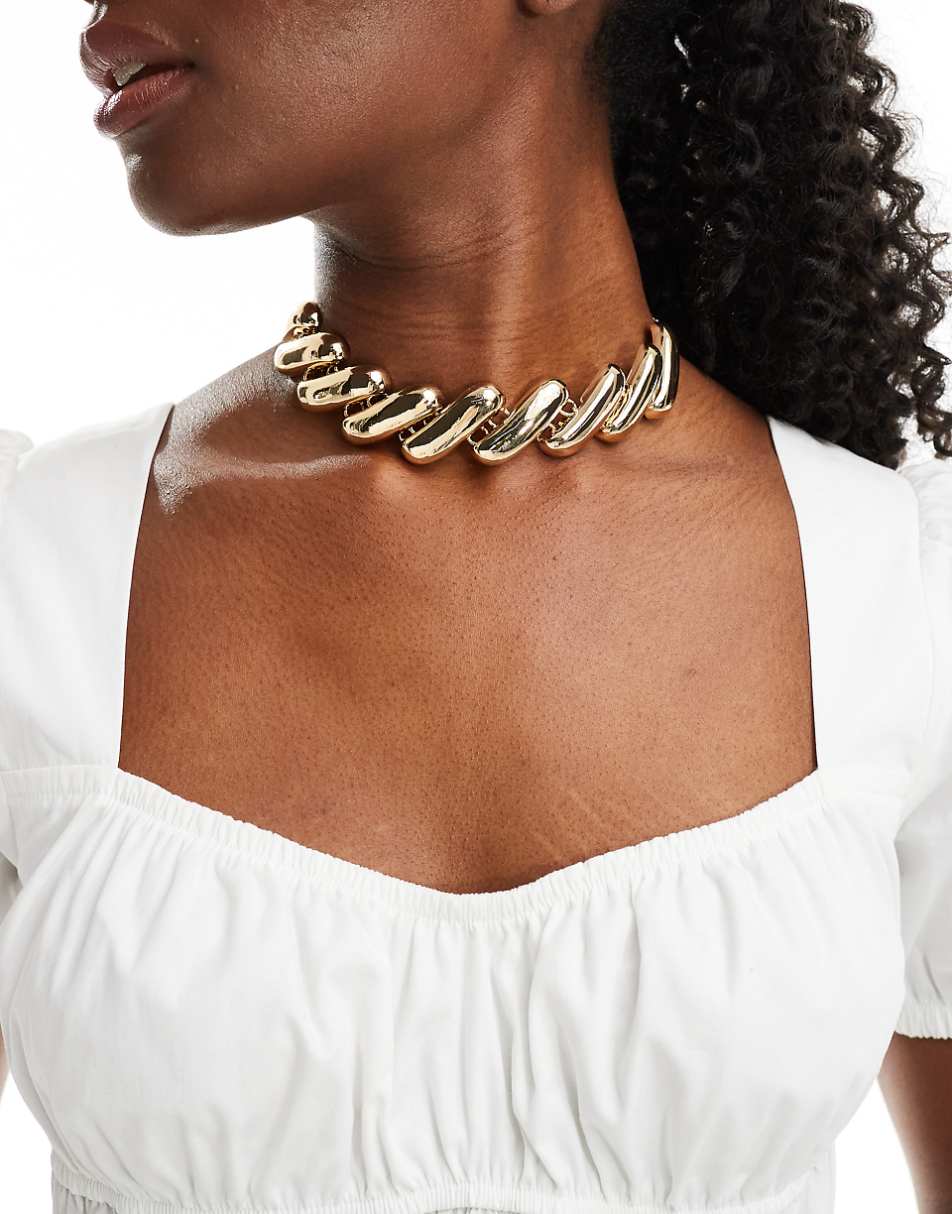 ASOS DESIGN choker necklace with ribbed design in gold tone