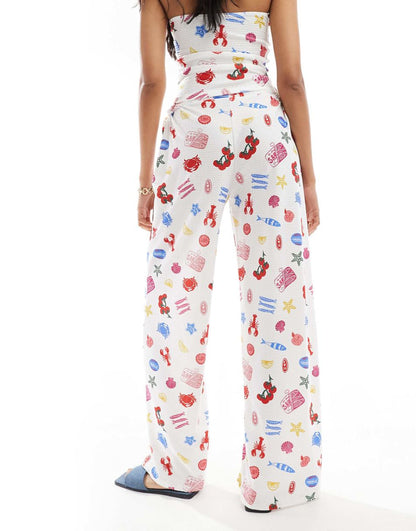 ASOS DESIGN textured wide leg pants in summer food print - part of a set
