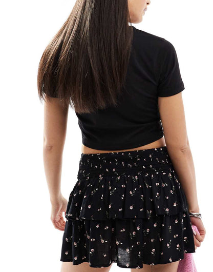 Bershka tiered mini rara skirt in black floral